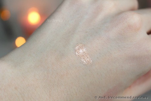 Becca Shimmering Skin Perfector Spotlight Liquid Highlighter in the shade #4 Opal swatches